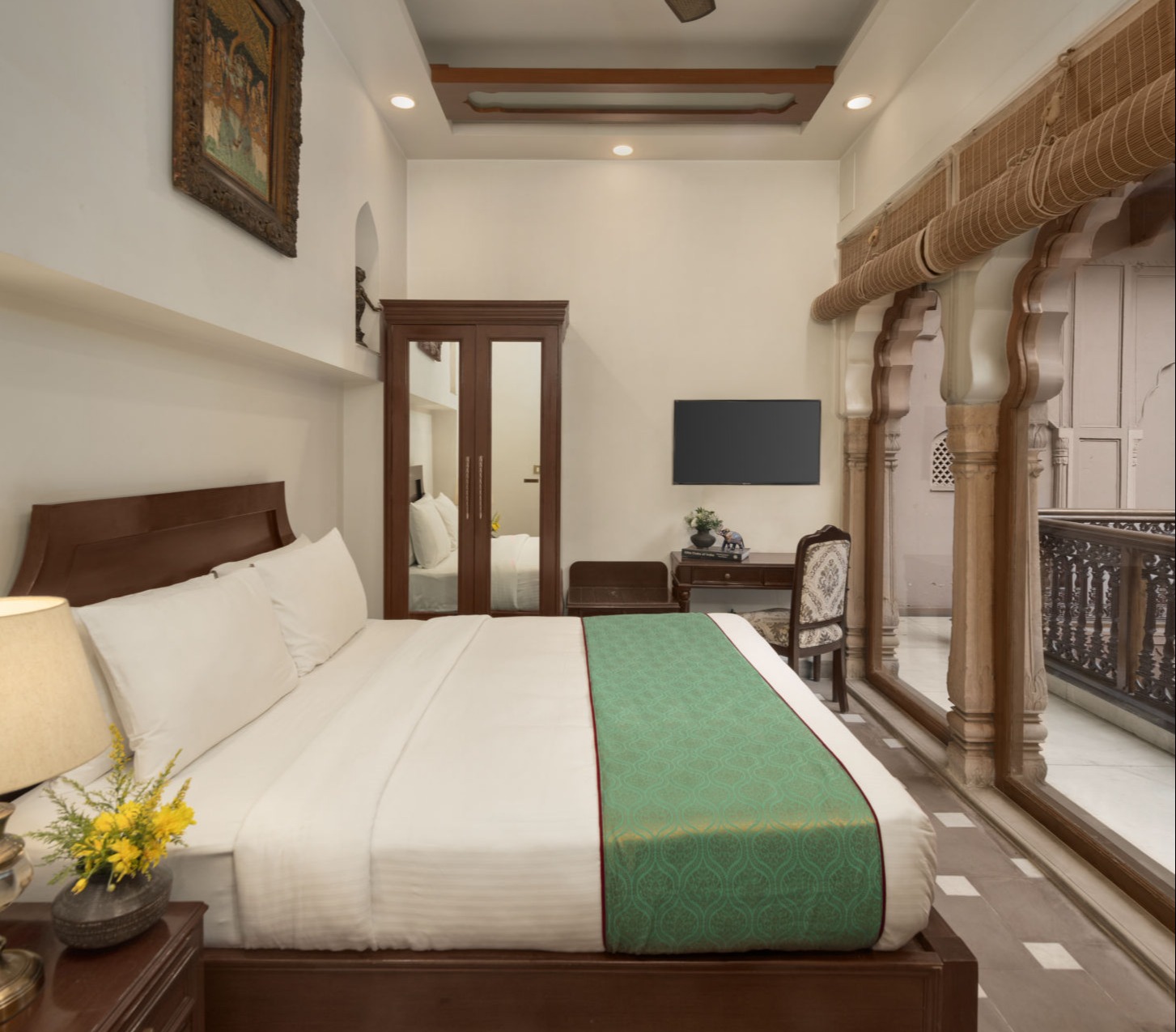 Enjoy a cosy ambience when you stay in one of our Jharoka Rooms at Haveli Dharampura, Old Delhi